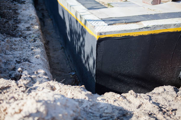 Professional Waterproofing technician working in Springport, IN